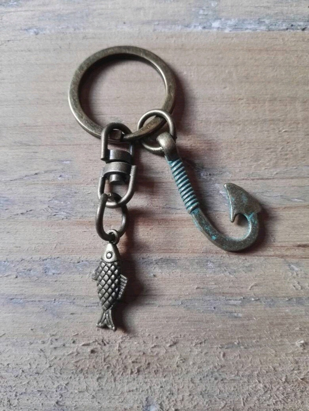 Nieuwe sleutelhanger met vis en vishaak, Ophalen of Verzenden, Nieuw, Dier of Natuur
