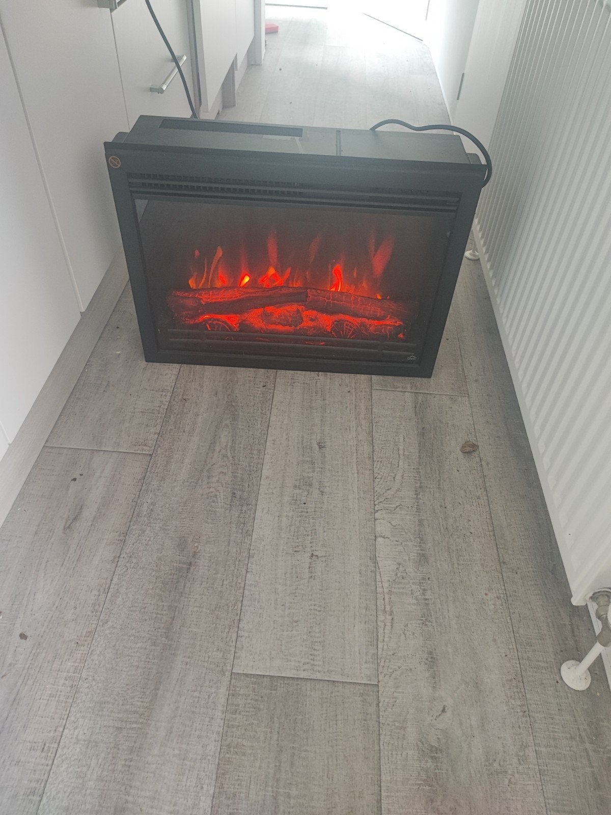 Elektrische haard Livn Lugano EF61C met afstandsbediening, Ophalen