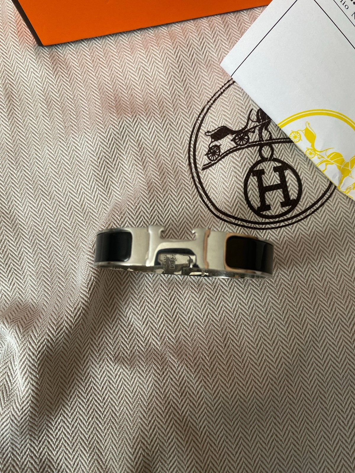 Hermès Clic H Armband Zwart/Zilver - Zo goed als nieuw, Ophalen of Verzenden, Zo goed als nieuw, Zwart, Staal