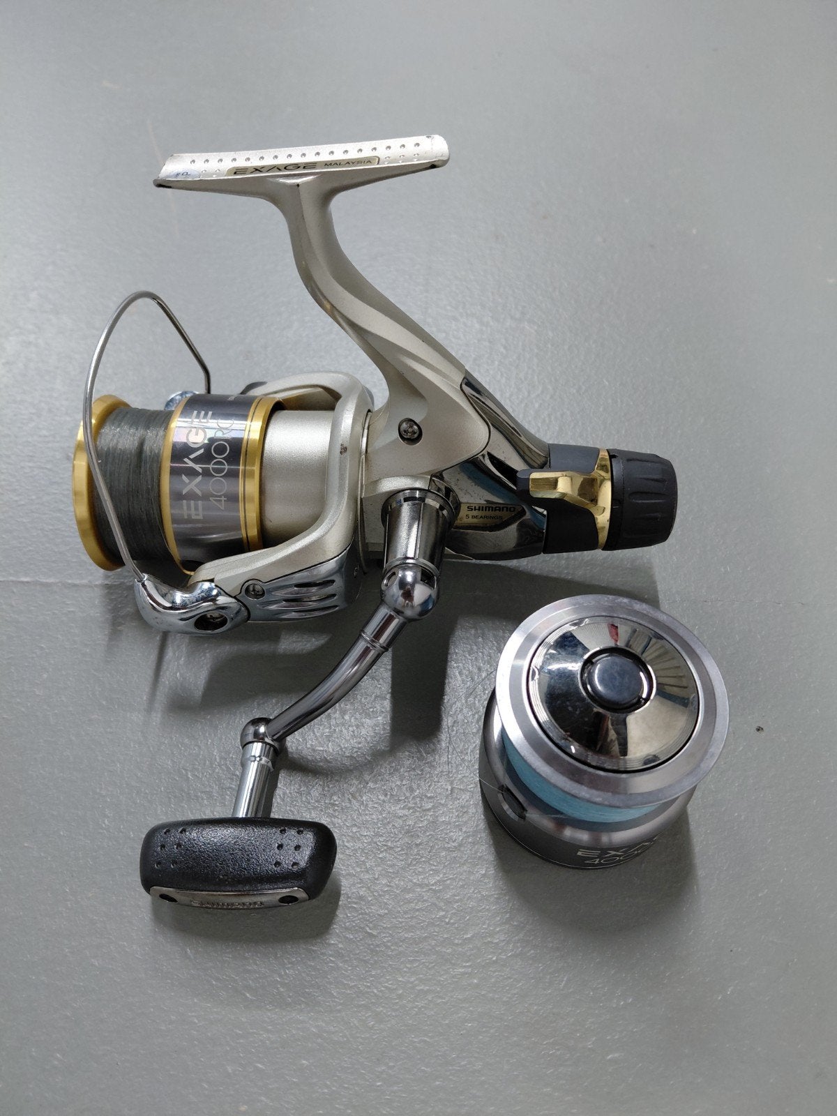 Shimano molen Exage 4000RC 5bb +res.spoel +nylon TEKST LEZEN, Ophalen of Verzenden, Zo goed als nieuw, Molen
