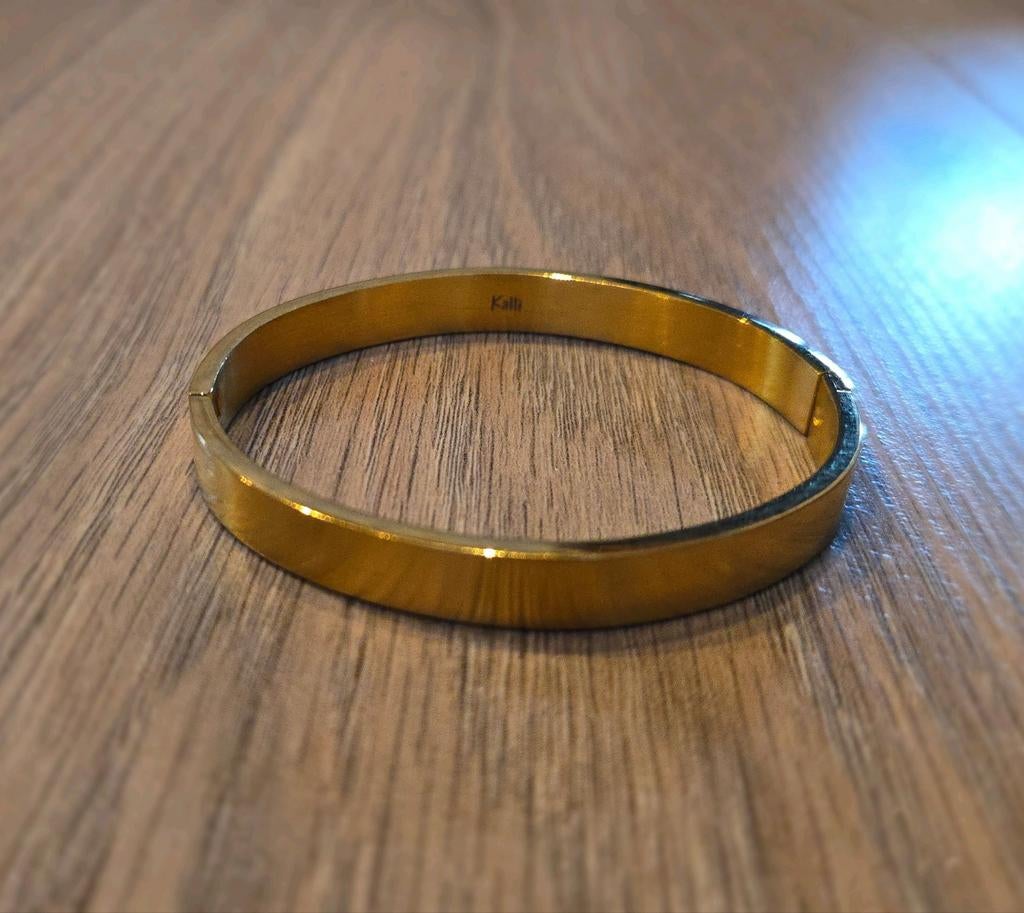 Kalli goudkleurige slaven armband van nikkelvrij edelstaal, Verzenden, Zo goed als nieuw, Goud, Staal