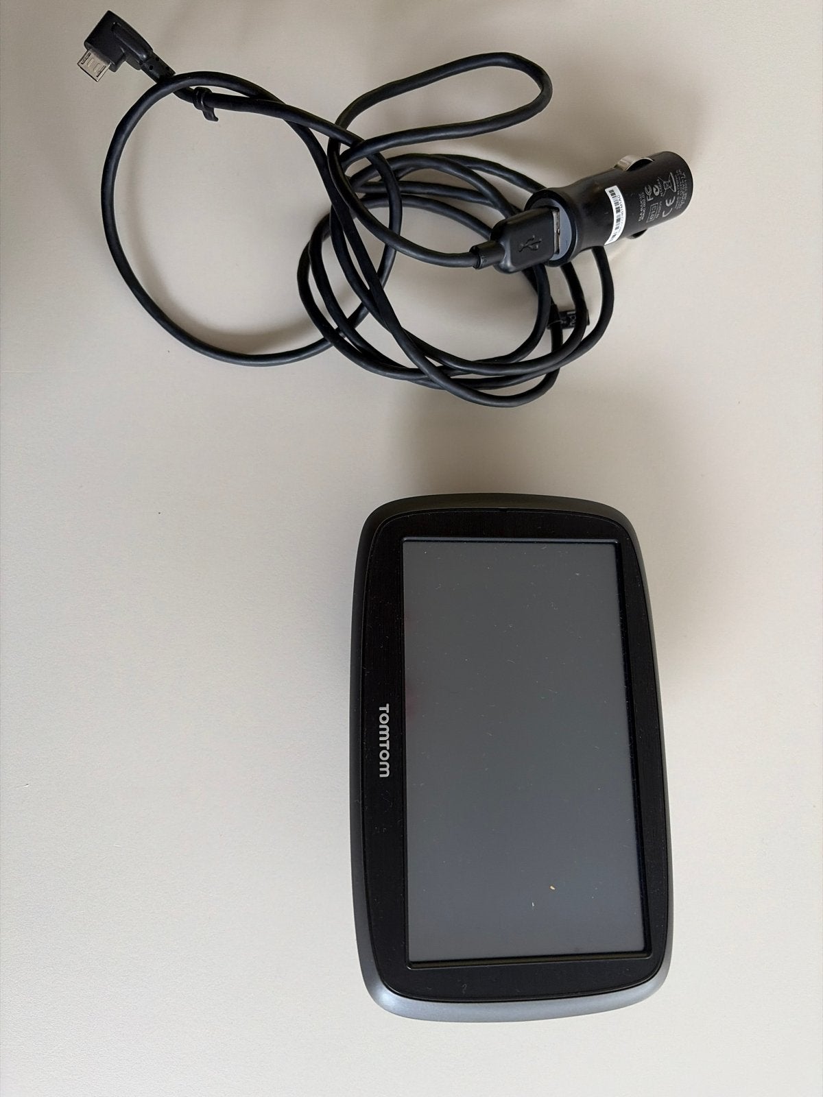 TomTom navigatiesysteem met oplader en zuignap, Ophalen of Verzenden, Gebruikt