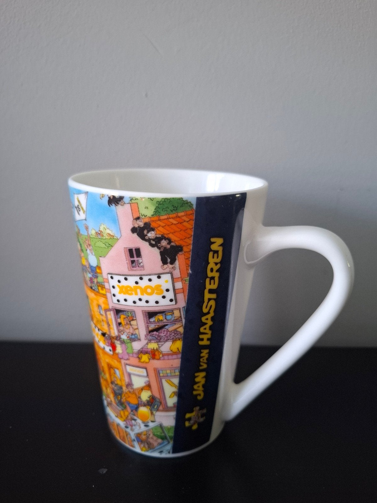 Jan van Haasteren Beker/Mok Xenos Special Edition, Meerkleurig, Overige stijlen, Ophalen of Verzenden, Zo goed als nieuw