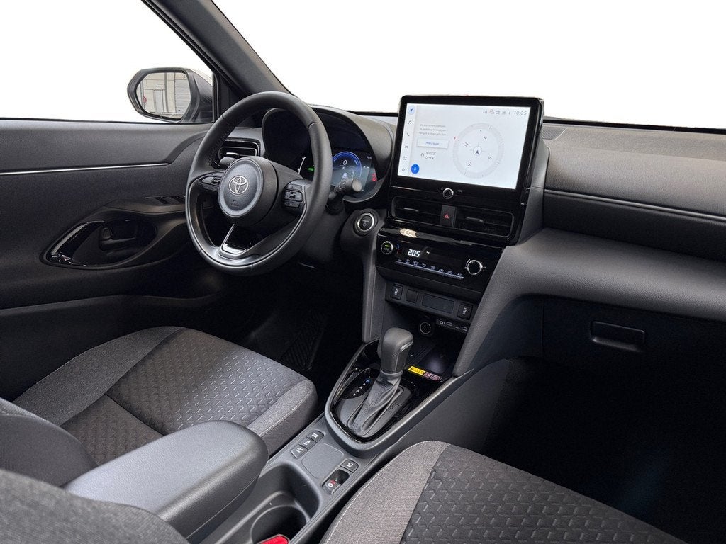 Toyota Yaris Cross 1.5 Hybrid 130 Dynamic I Direct leverbaar, Auto's, Toyota, Gebruikt, Wit, 1490 cc, Bedrijf