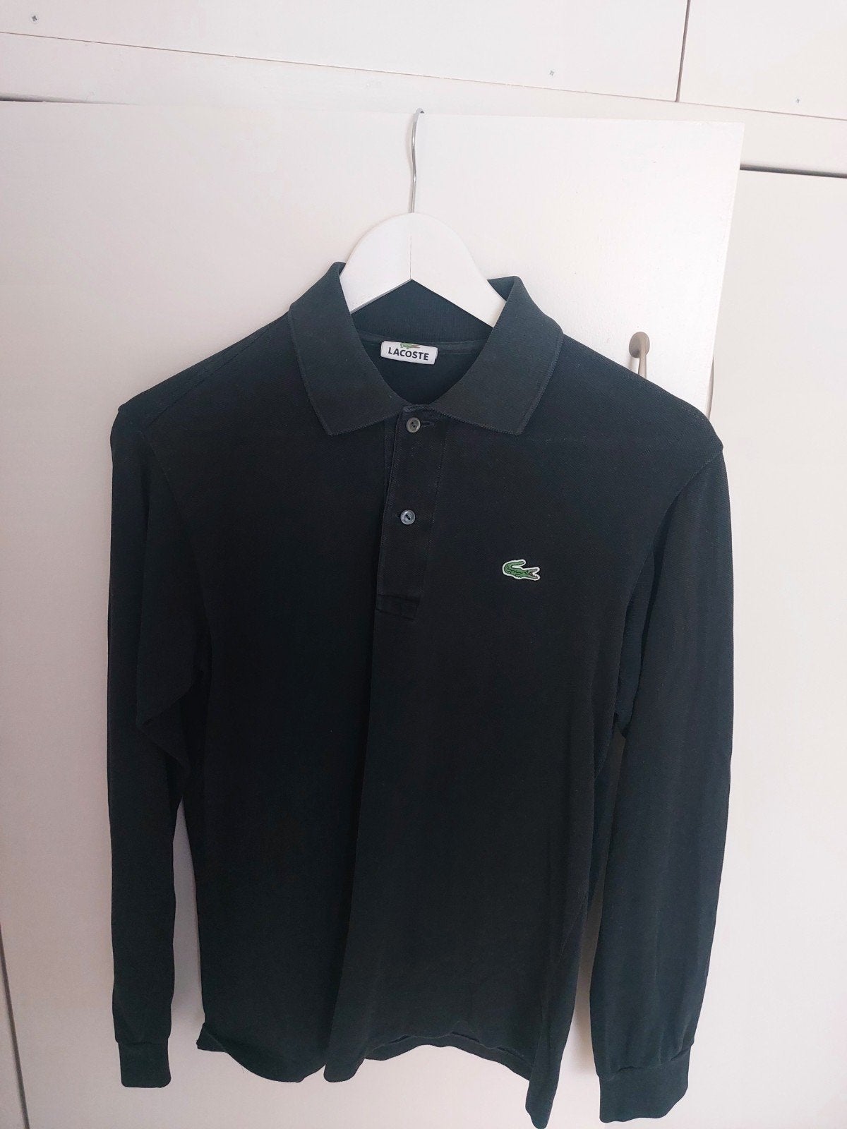 Zwarte Lacoste polo longsleeve  maat 2, Ophalen of Verzenden, Gedragen, Zwart