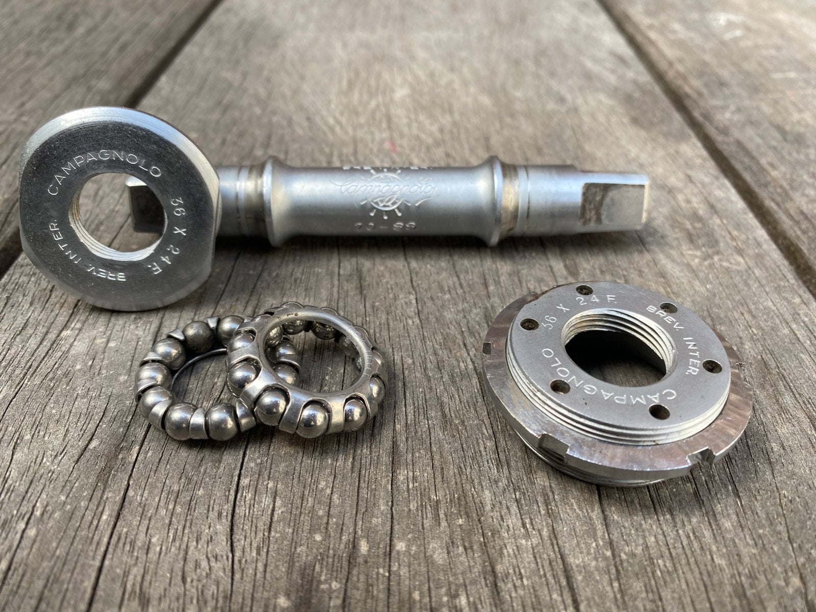 Vintage Campagnolo Nuovo Record Bottom bracket inc stofkap, Fietsen en Brommers, Fietsonderdelen, Ophalen of Verzenden, Gebruikt