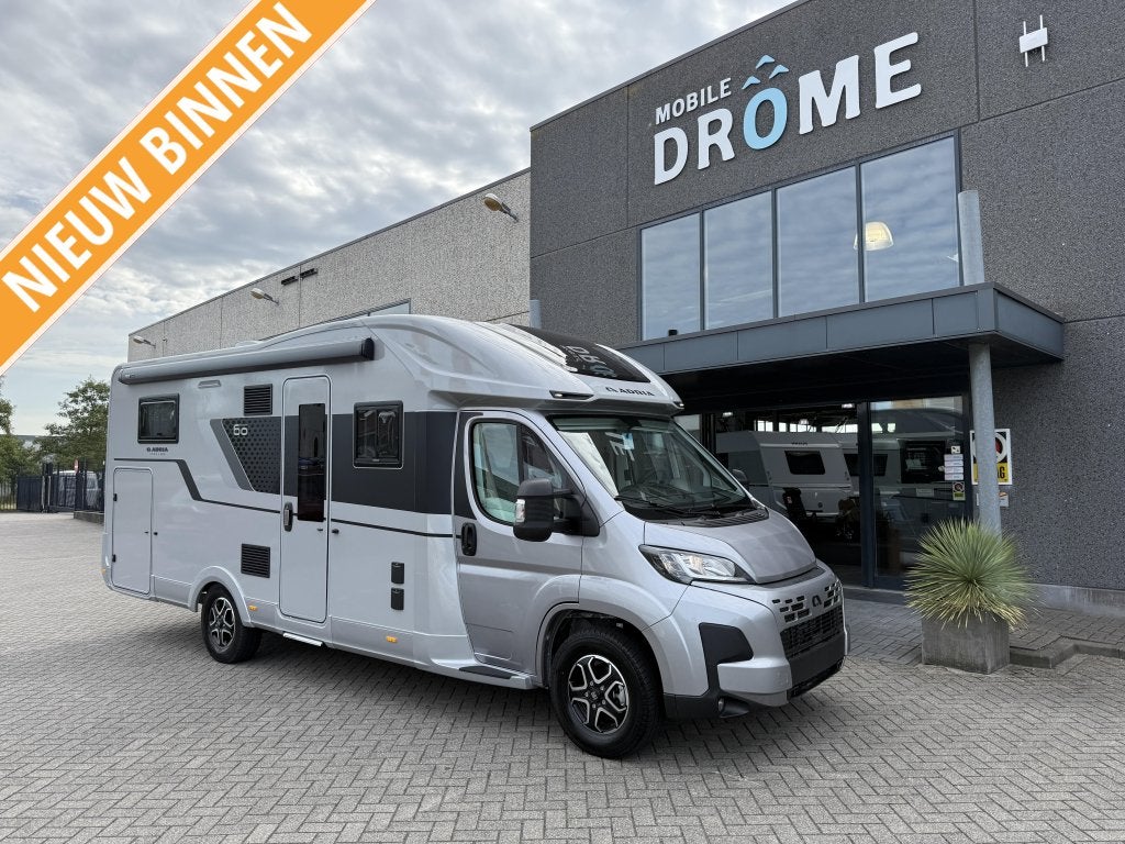 Adria Coral 670 DL 60 Years, Caravans en Kamperen, Campers, Automaat, Ringverwarming, Fiat, 7 tot 8 meter