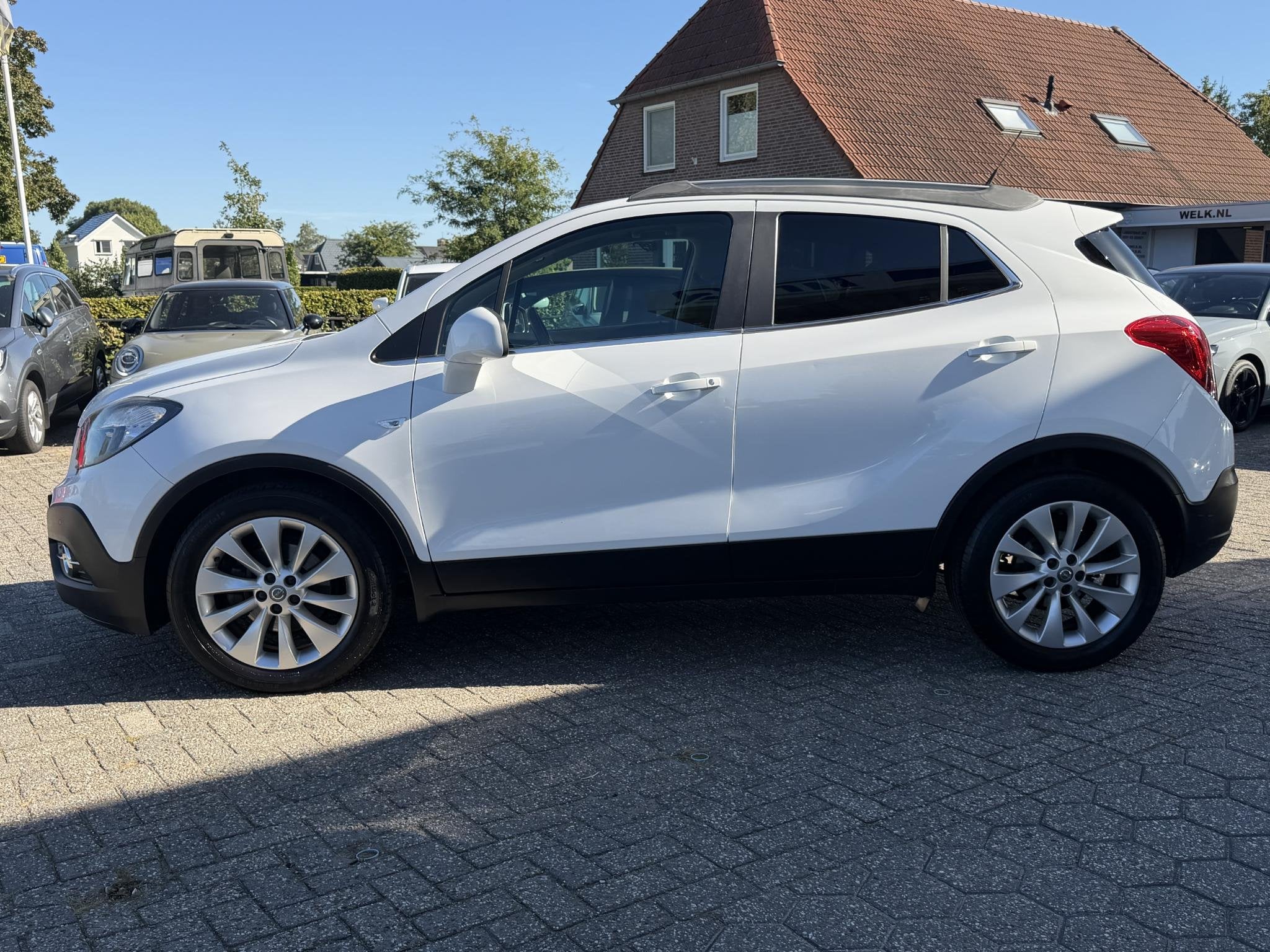 Opel Mokka 1.4 T Cosmo NAVI | CAMERA | TREKHAAK | HOGE INSTA, Auto's, Voorwielaandrijving, 12 maanden, Gebruikt, Euro 6