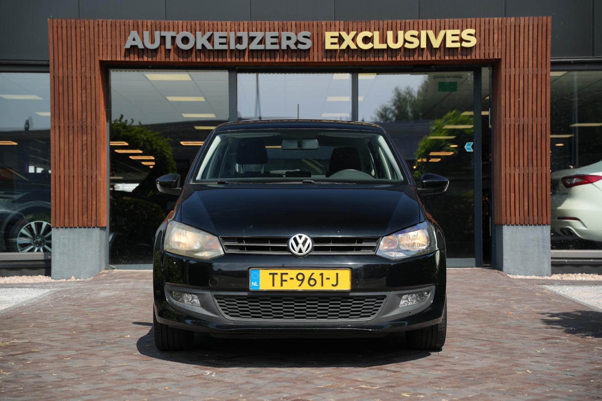 Volkswagen Polo 1.2-12V Comfortline Airco Cruise Control, Voorwielaandrijving, Euro 5, 1198 cc, Zwart