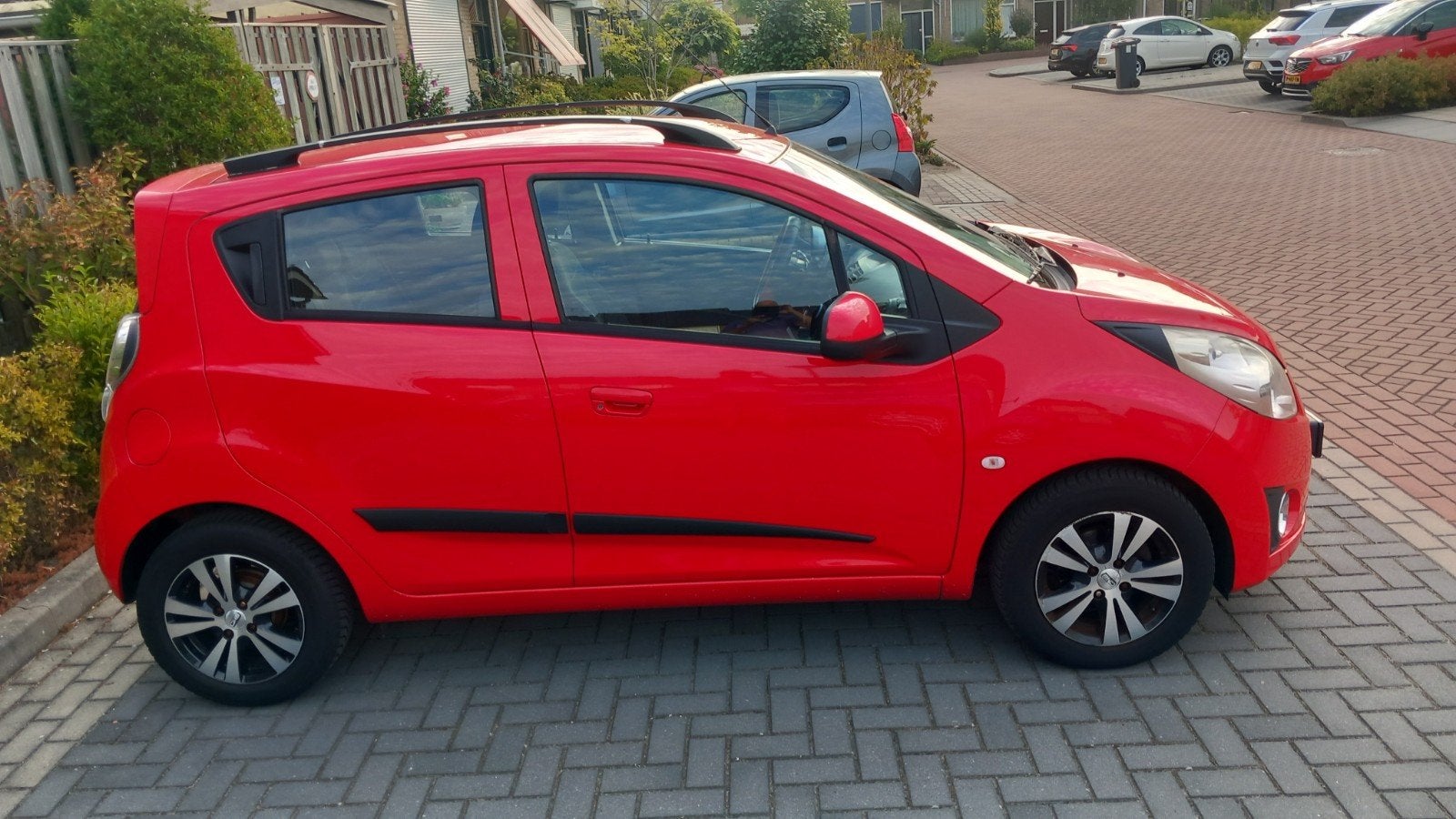Chevrolet Spark 1.2 2012 Rood, Voorwielaandrijving, 4 cilinders, Particulier, 81 pk