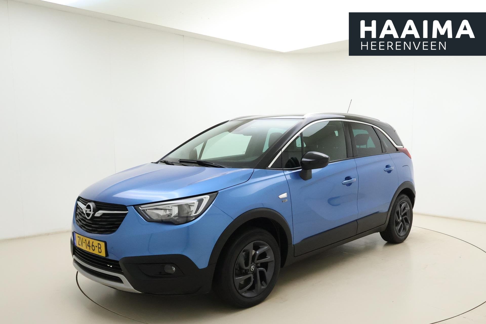Opel Crossland X 1.2 Turbo 110pk Automaat 120 Jaar Edition |, Gebruikt, Blauw, Automatische klimaatregeling, Origineel Nederlands