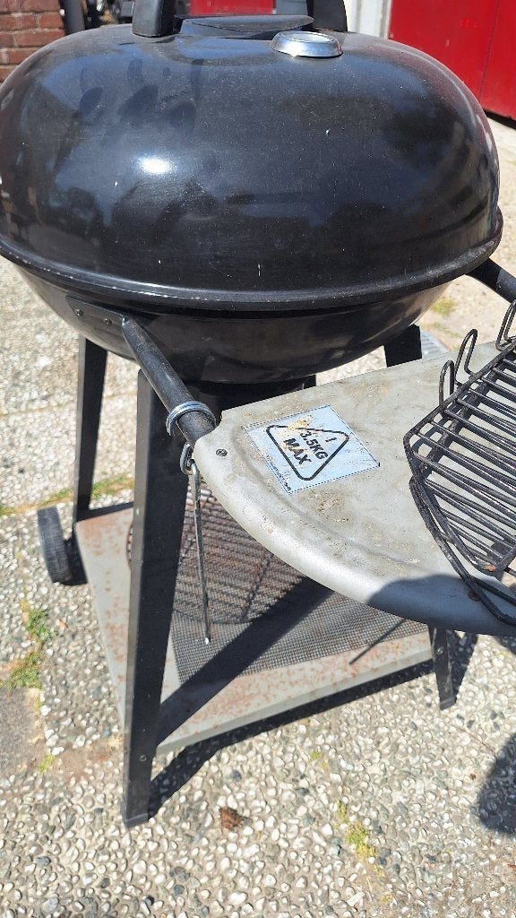 buiten barbeque houtkool, Ophalen