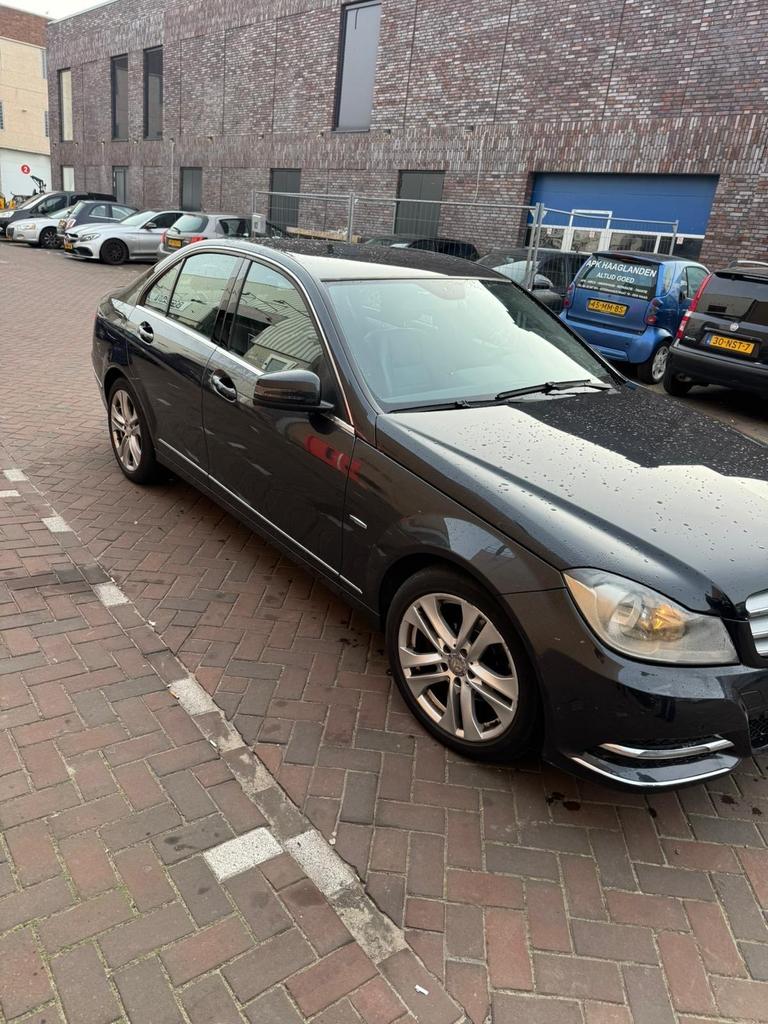 Mercedes-Benz C-Klasse 1.8 C200 Kompressor Sedan AUT 2012, Auto's, 1800 kg, Zwart, 4 cilinders, 1796 cc
