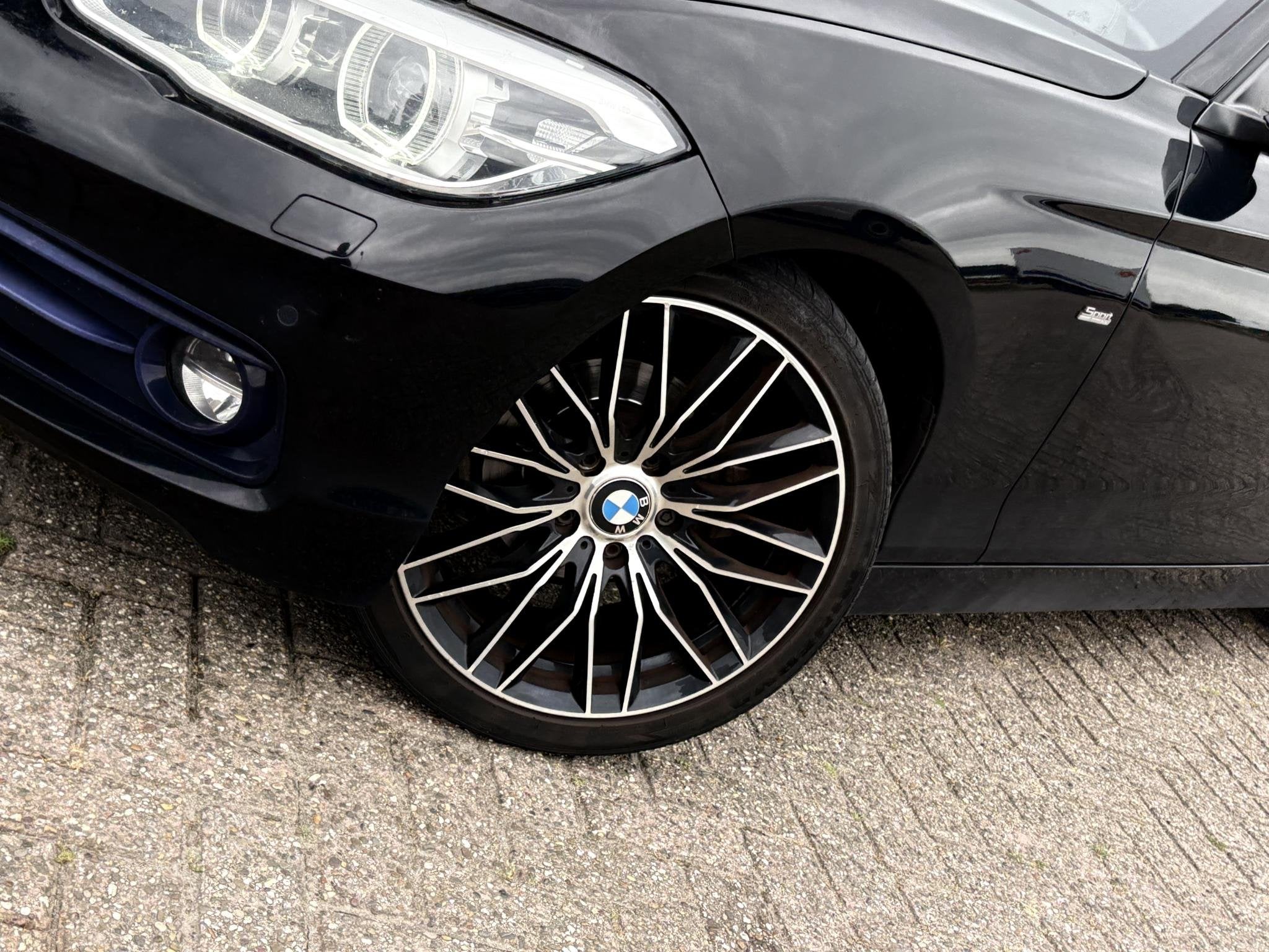 BMW 1-serie 118i High Executive Sport | AUT | STOELVERW. | T, Gebruikt, Automatische klimaatregeling, Zwart, Leder