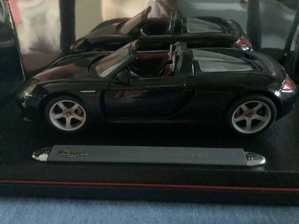 Porsche Carrera GT 1:18, Ophalen of Verzenden, Zo goed als nieuw, Auto, Maisto