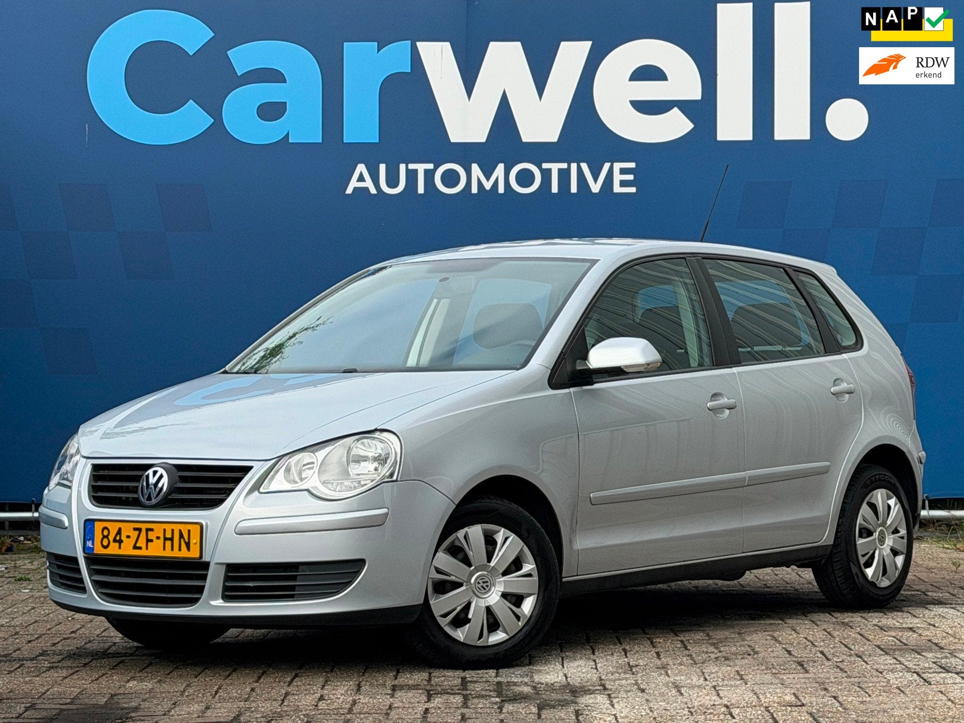 Volkswagen Polo 1.4-16V Optive|1e Eigenaar|NieuweAPK!|Airco|, Auto's, Voorwielaandrijving, Dealer onderhouden, Stof, Zwart