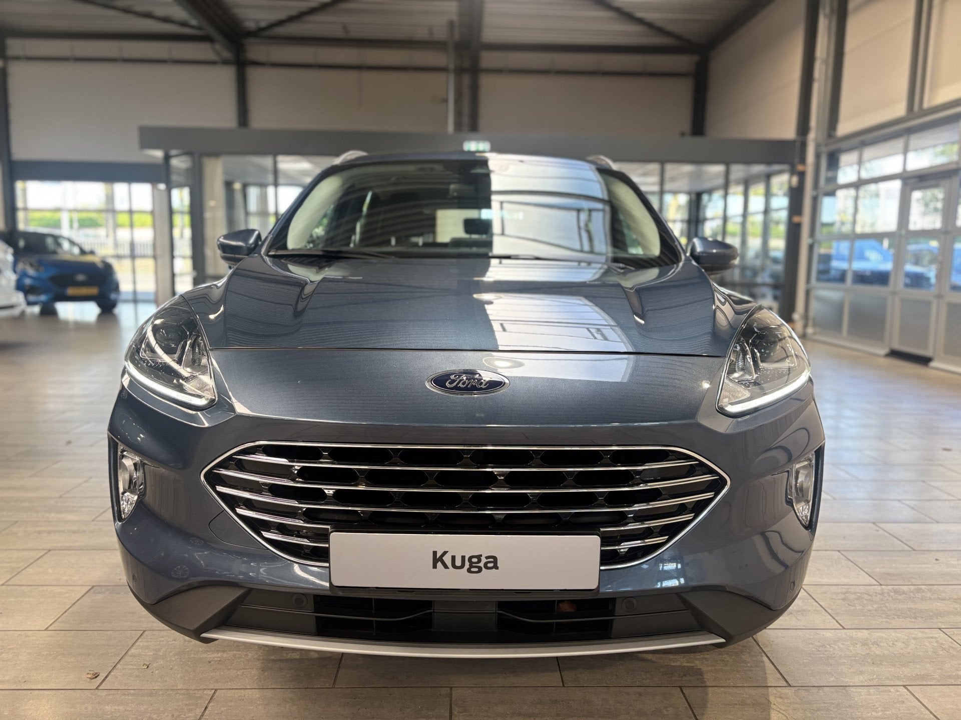 Ford Kuga 2.5 PHEV 225 pk Titanium | Trekhaak | Winter Pack, Gebruikt, 4 cilinders, Blauw, Plug-in hybride