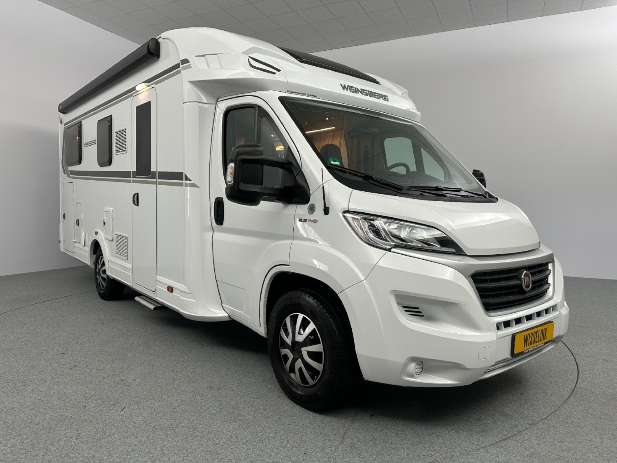Weinsberg CaraSuite 700 MEG Enkele bedden Hefbed, Caravans en Kamperen, Hordeur, 7 tot 8 meter, Bedrijf, Elektrische ramen