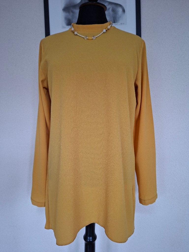 Okergele tuniek met lange mouwen en rits op de rug, Maat 38/40 (M), Primark, Geel, Ophalen of Verzenden