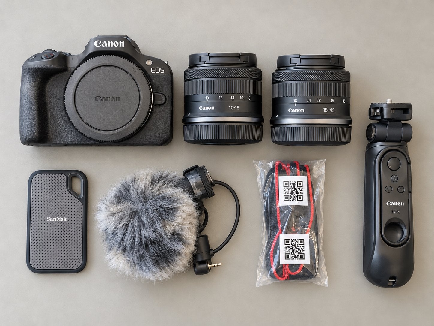 Canon EOS R50 complete vlogset + 2 lenzen + SanDisk 1TB, Canon, Ophalen of Verzenden, Zo goed als nieuw, Draagriem