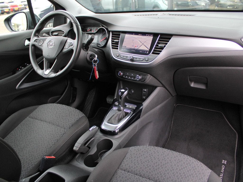 Opel Crossland X 1.2 Turbo Innovation Automaat | Navi / Airc, Auto's, 12 maanden, Gebruikt, Zwart, Origineel Nederlands
