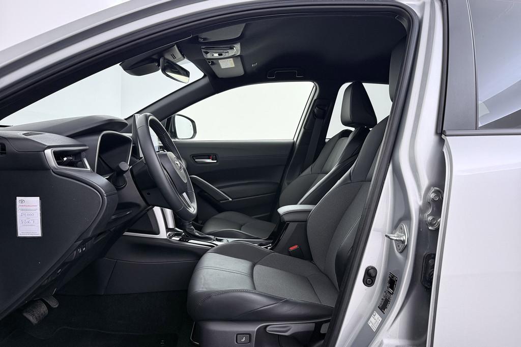 Toyota Corolla Cross Hybrid 140 Style | Trekhaak | Org NL |, Gebruikt, 4 cilinders, Leder en Stof, Origineel Nederlands