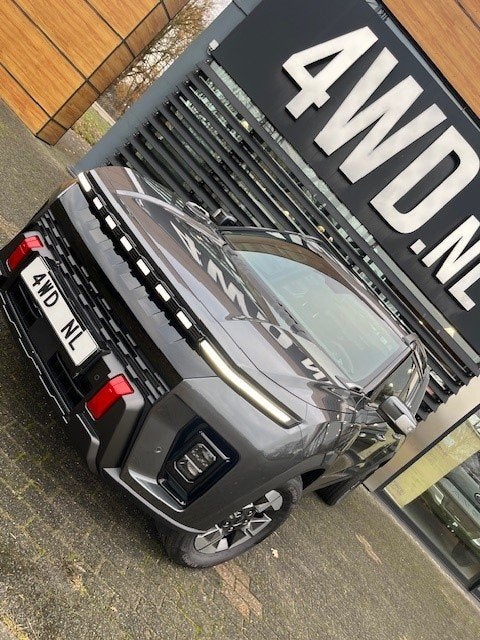 KGM MUSSO EV 82 KW PICK UP 5 pers 1800 KG trekhaak VOORRAAD, Auto's, 81 kWh, Zwart, Leder, Te koop