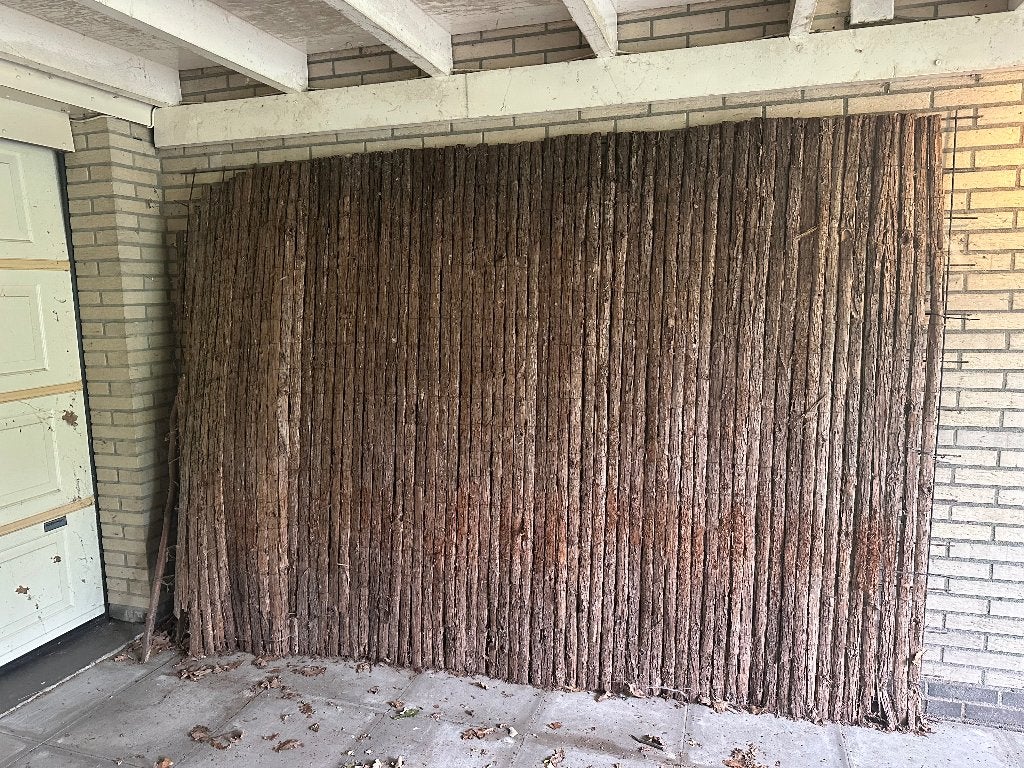 Betonraster schutting met boomschors, Tuin en Terras, Aarde en Mest, Ophalen of Verzenden, Boomschors