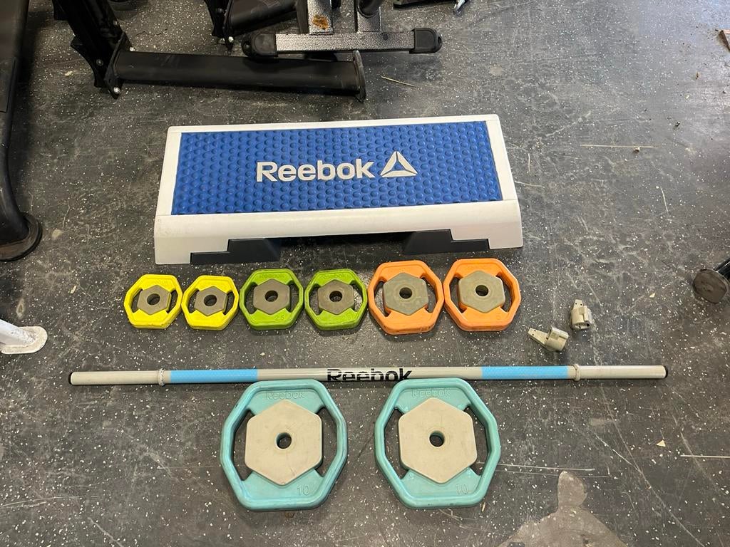 Reebok rep 40 kg bodypump set met step, Sport en Fitness, Fitnessmaterialen, Gebruikt, 40 kg rep set, Ophalen of Verzenden, Reebok