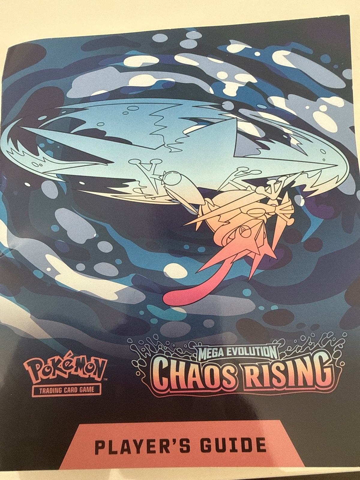 Pokémon TCG Mega Evolution Chaos Rising Player's Guide, Ophalen of Verzenden, Zo goed als nieuw, Boek of Catalogus