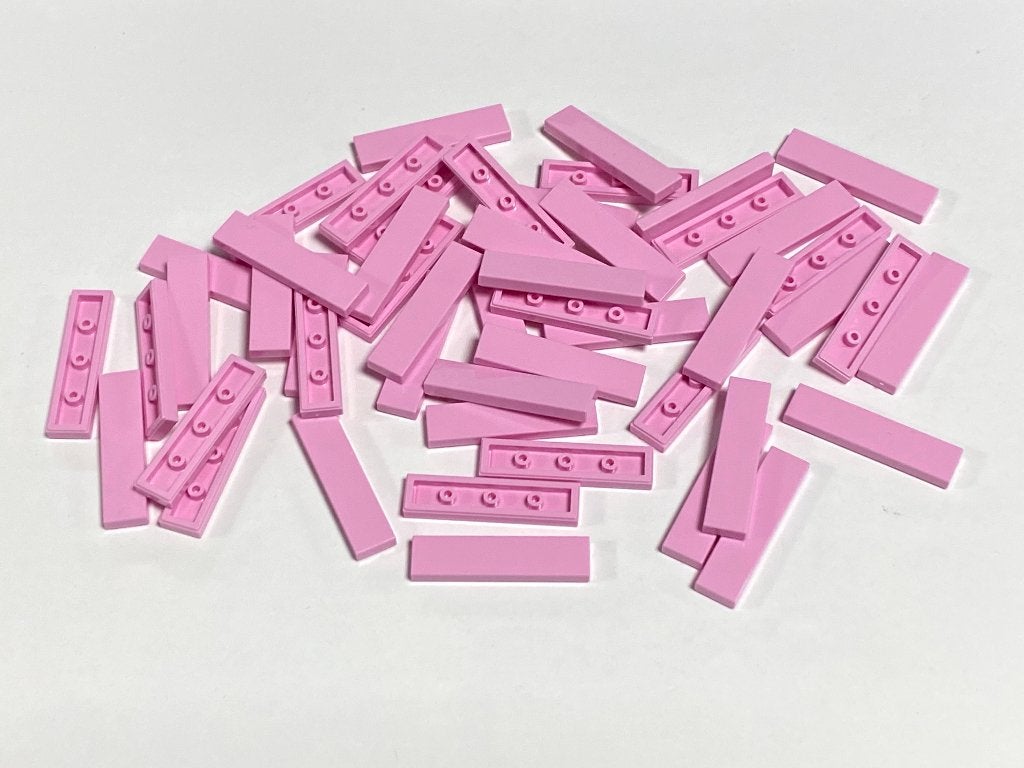 Partij nieuwe 50x 1x4 Lego tegels diverse kleuren