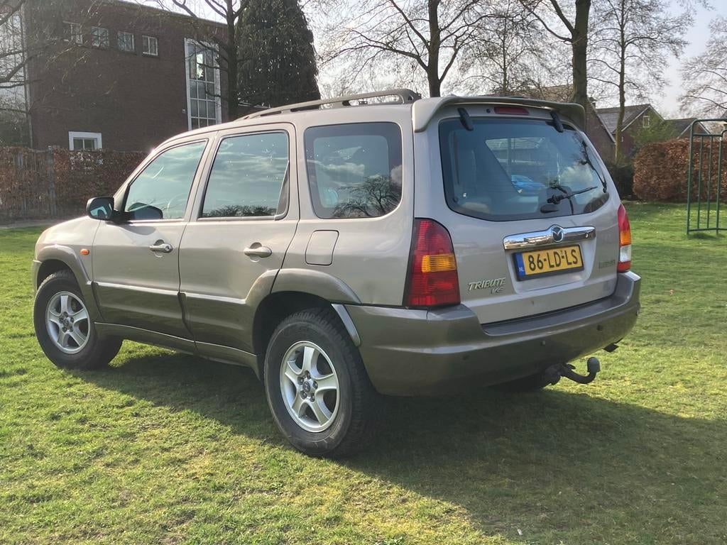 Mazda Tribute 3.0 V6 Touring AUT 4WD 2002 Bruin, Auto's, Automaat, Dakrails, Bruin, Particulier