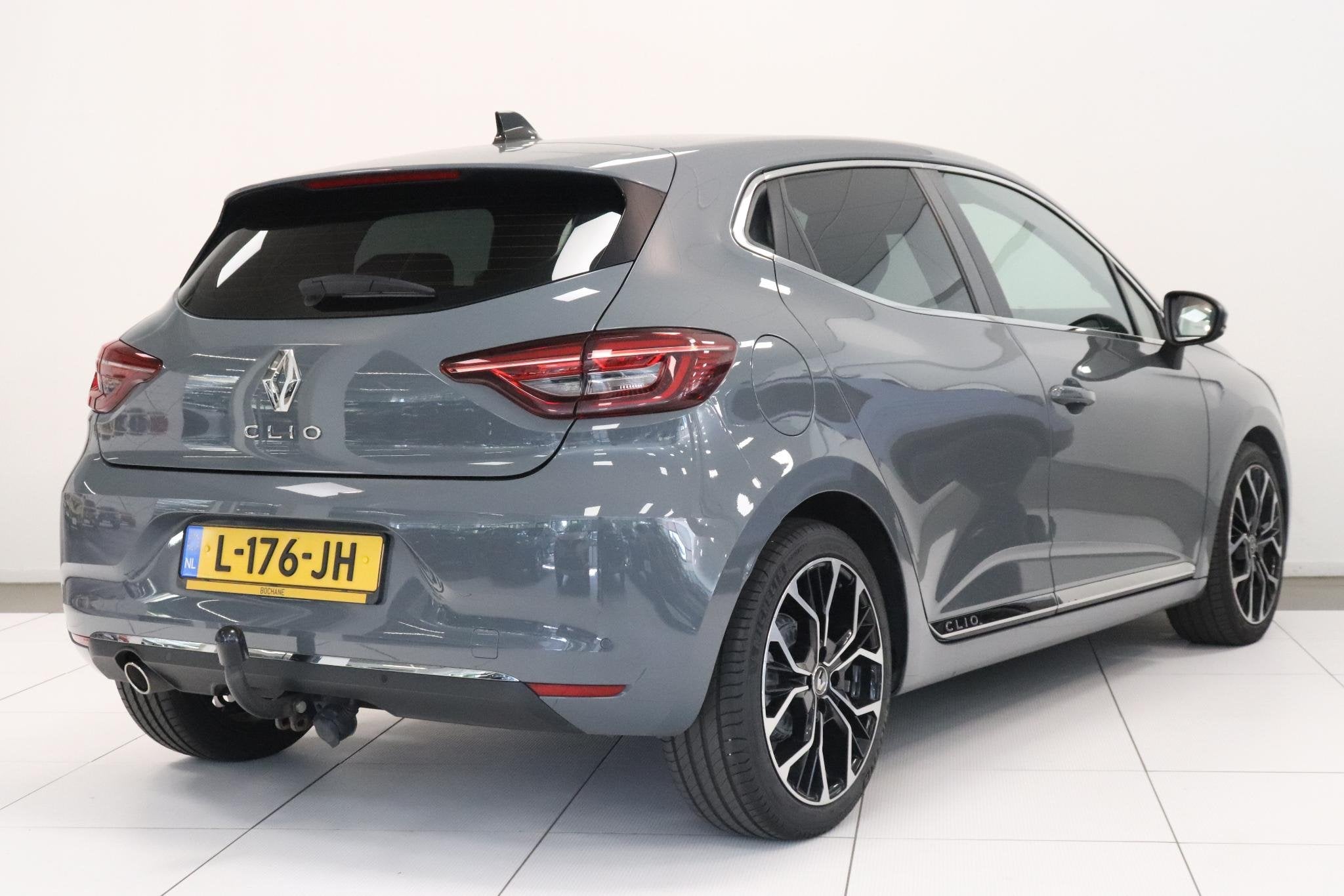 Renault Clio 1.0 TCe Intens Bi-Fuel | Parkeersensor | Climat, Voorwielaandrijving, Gebruikt, Met garantie (alle), Leder en Stof
