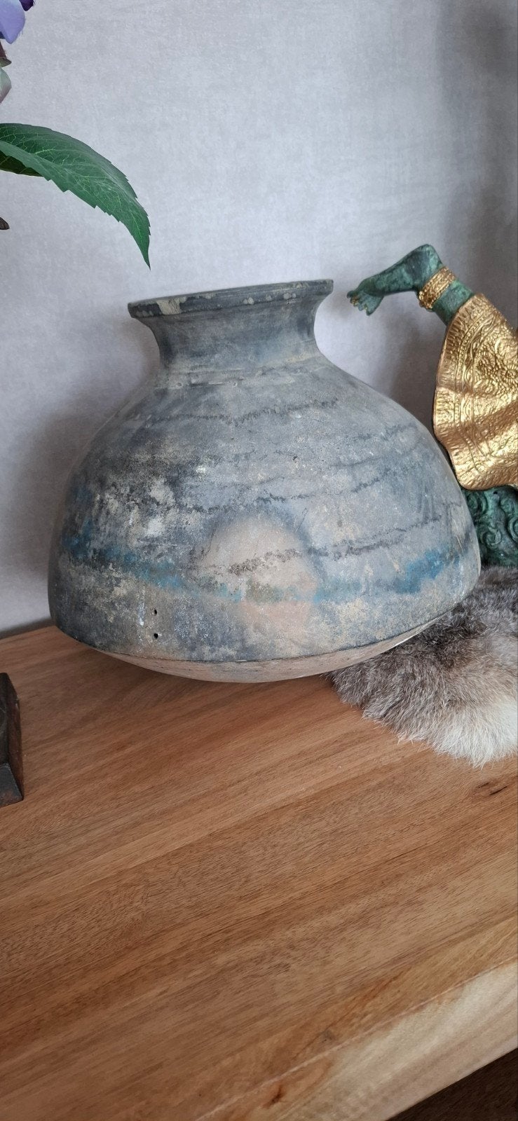 aura peeperkorn kruik, Ophalen