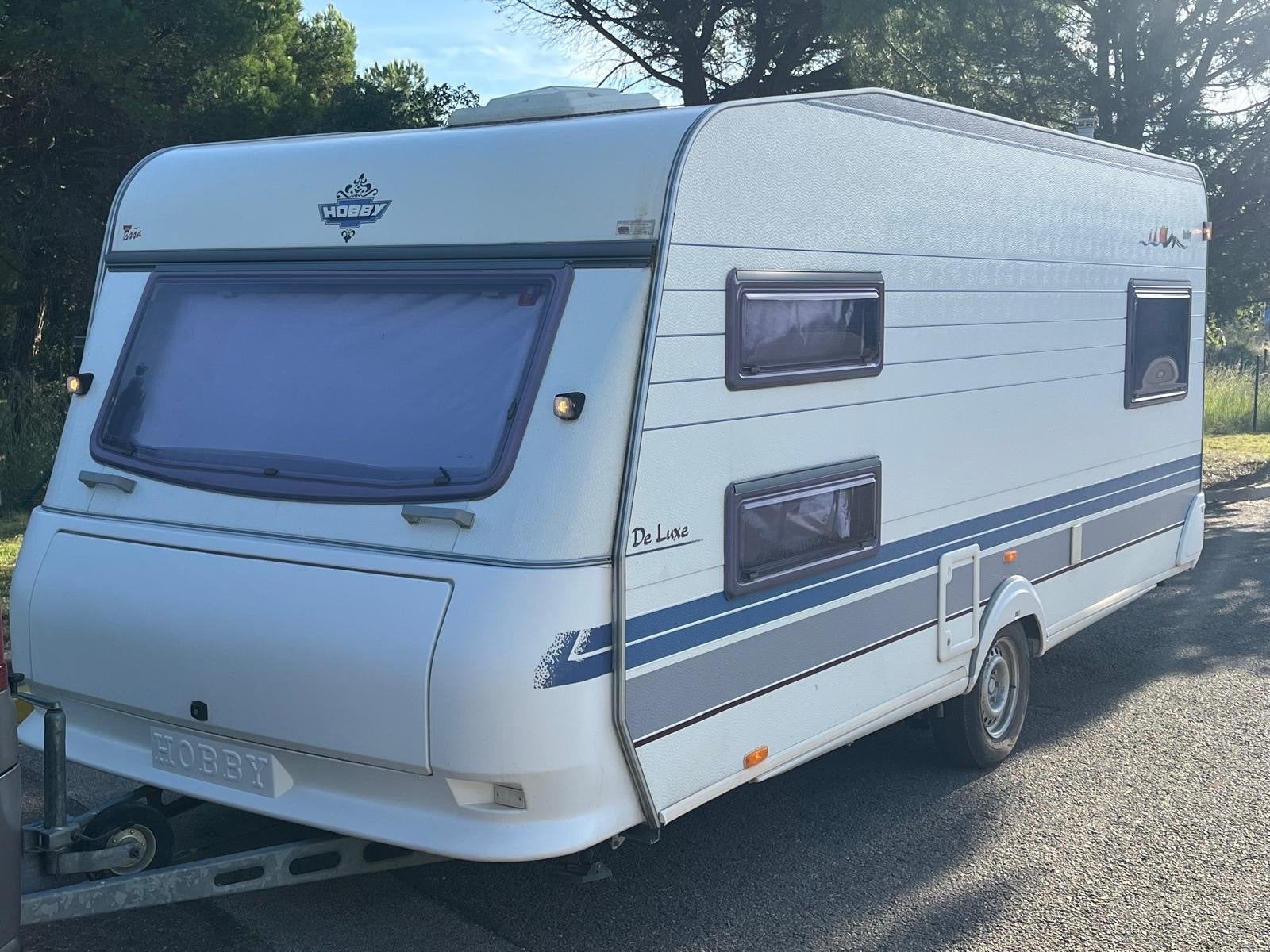 Hobby 495 De Luxe caravan incl.Stabelbed, Schokbreker, Hobby, Omvormbare zithoek, Bedrijf