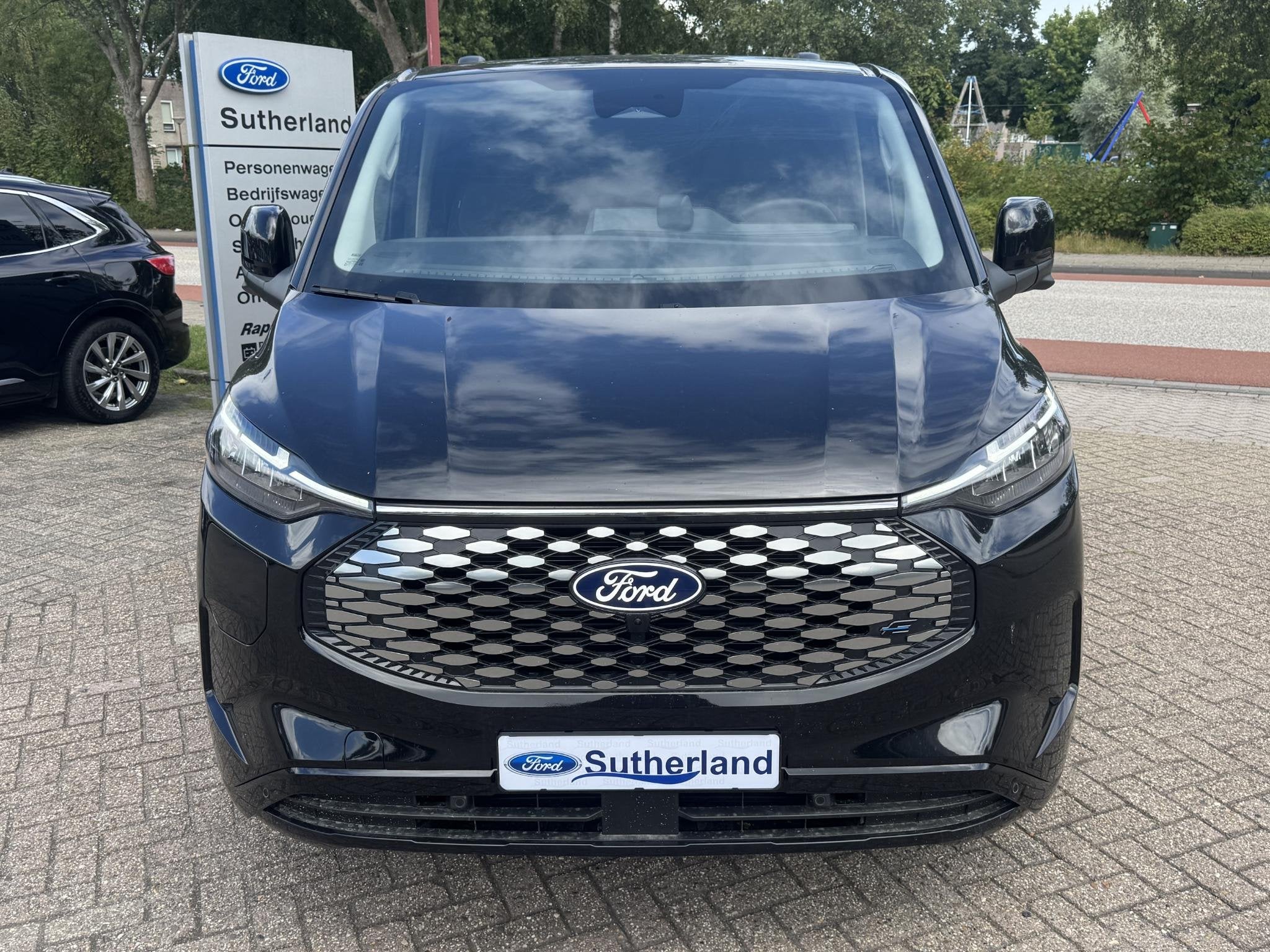 Ford E-Transit Custom 340 L2H1 Limited 71 kWh | SCI | 218pk, Auto's, Automaat, Zwart, 71 kWh, Zwart