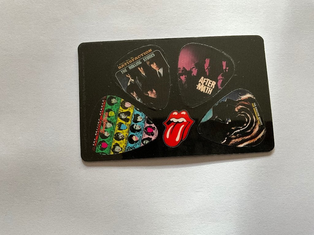 4 uitneembare plectrums van The Rolling Stones, Nieuw, Ophalen of Verzenden, Boek, Tijdschrift of Artikel, 4 uitneembare plectrums van The Rolling Stones