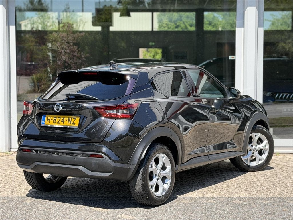 Nissan Juke 1.0 DIG-T 117pk DCT Tekna | Sound & Ride | Bose, Auto's, Nissan, Leder en Stof, Zwart, Bedrijf, 3 cilinders