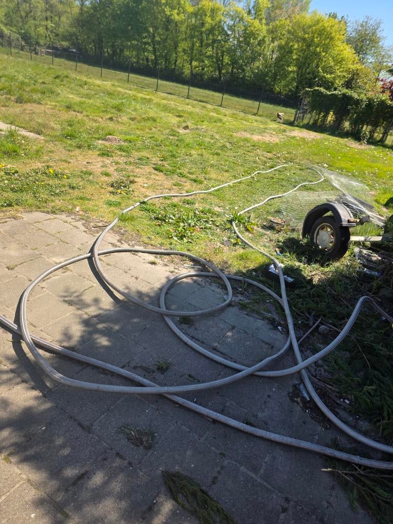 Tuinslang met rvs mantel van eriks ongeveer 50 meter, Ophalen of Verzenden, Tuinslang