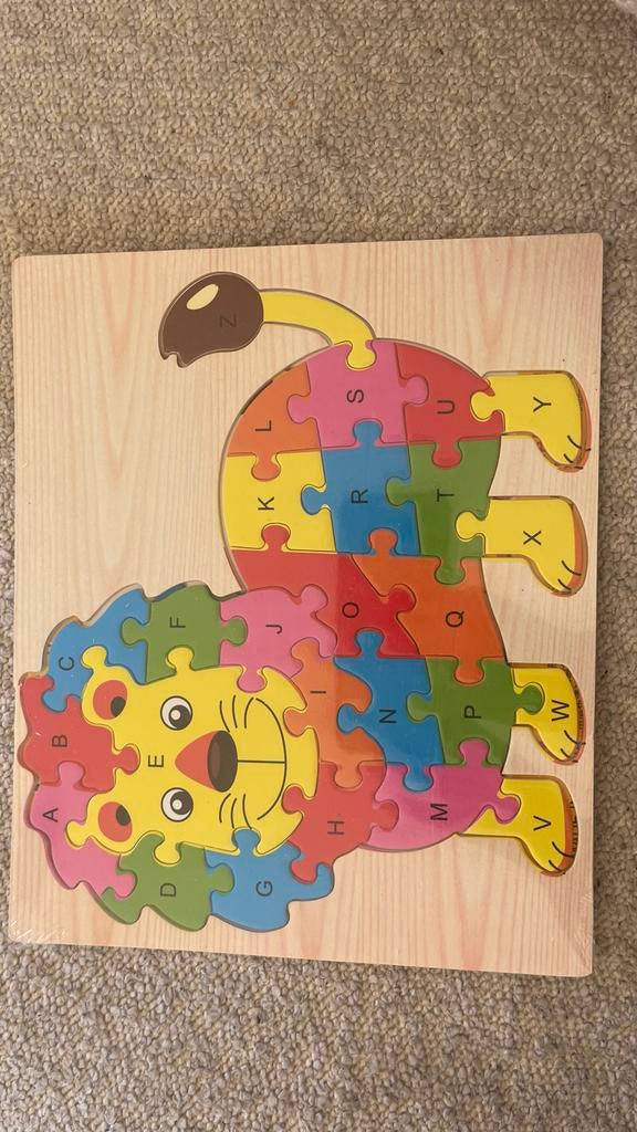 Nieuwe houten leeuwenpuzzel met letters, Ophalen of Verzenden, Minder dan 500 stukjes, Nieuw, Legpuzzel