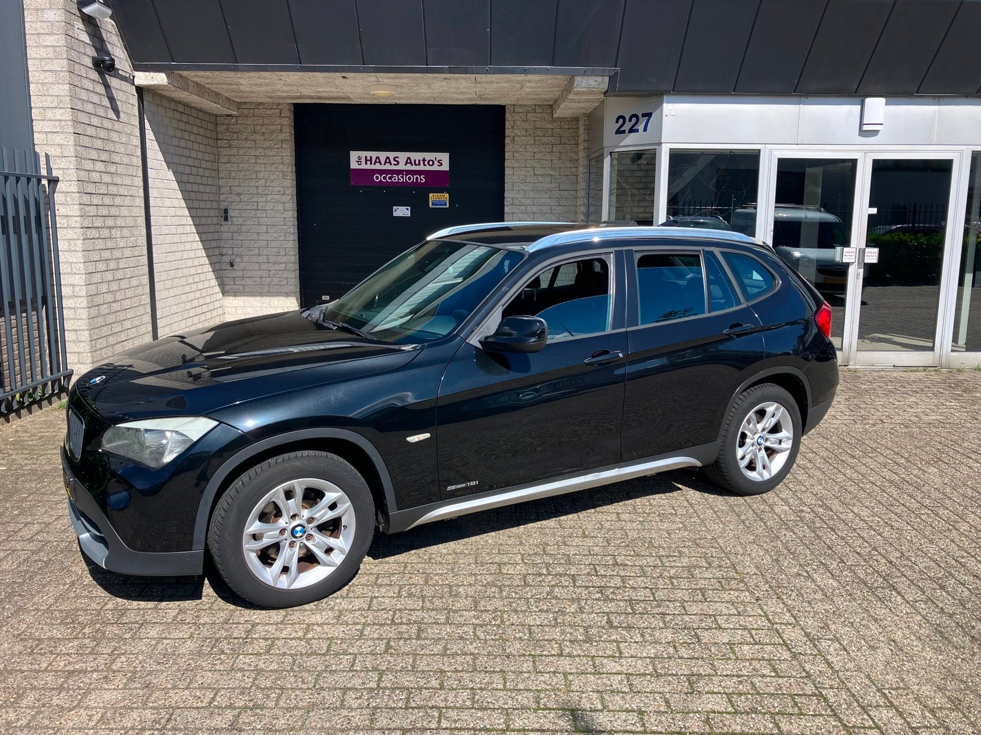 BMW X1 SDrive18i Executive / CLIMATE / NAVI / CRUISE / ALU V, X1, Euro 5, Zwart, 4 cilinders