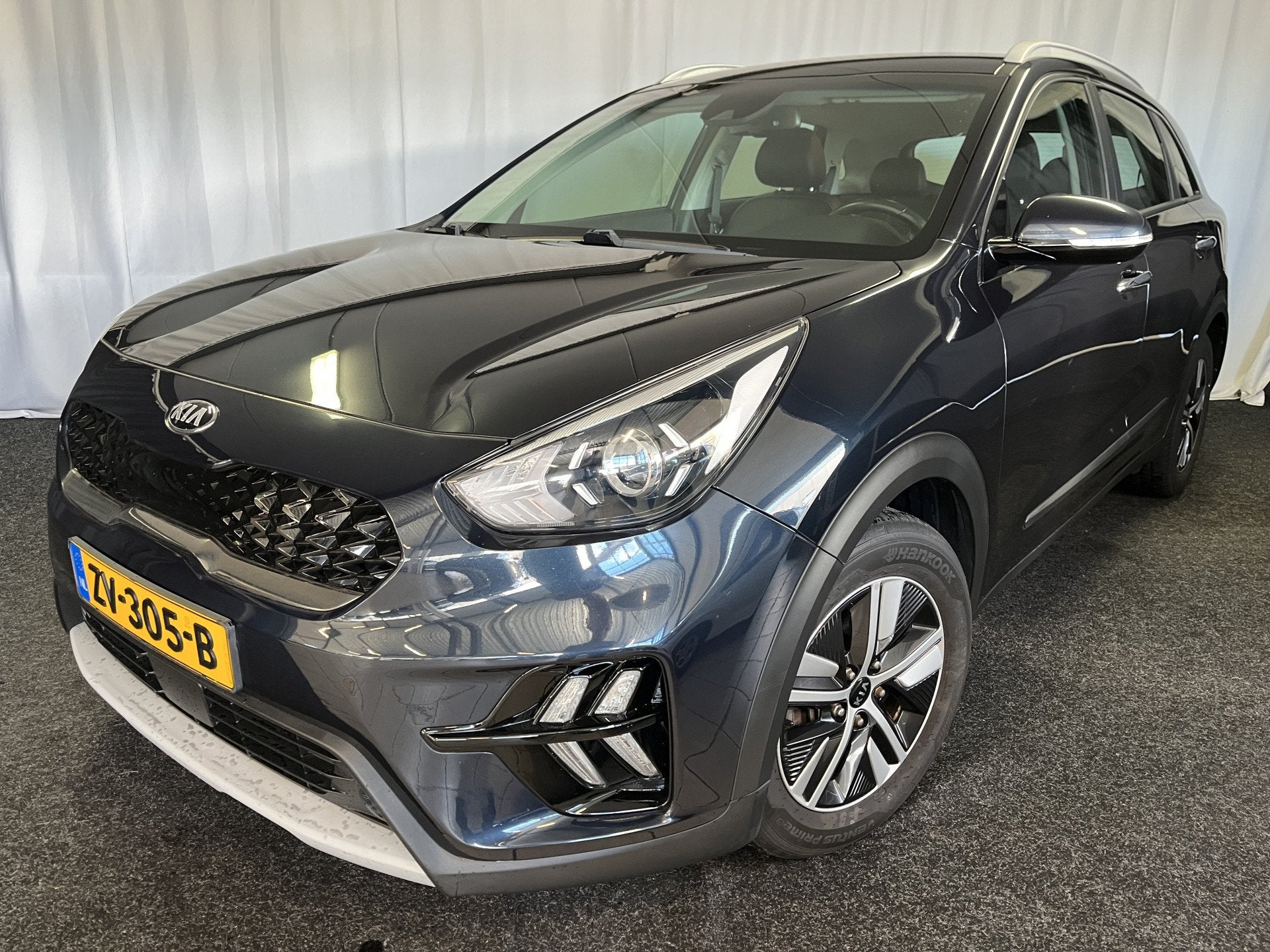 Kia Niro 1.6 GDi Hybrid DynamicLine 1E EIGN/ADAPTIVE/APPLE/C, Gebruikt, Blauw, Leder en Stof, Origineel Nederlands