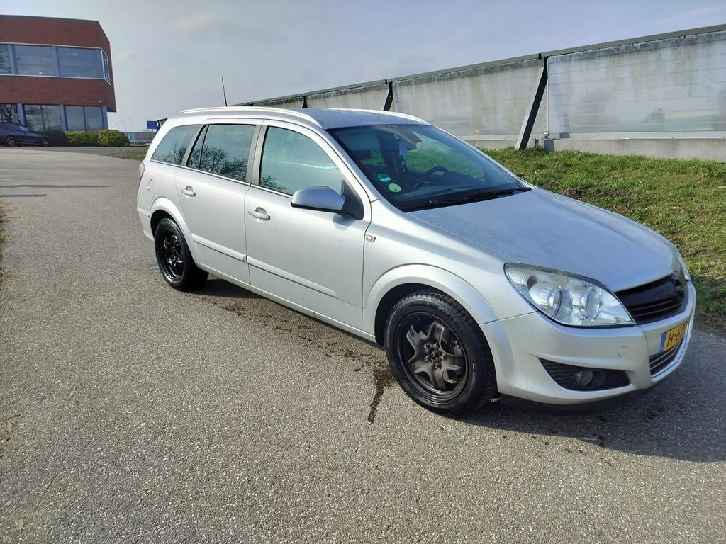 Opel Astra H Stationwagon 1.6L, Auto's, Opel, Leder en Stof, Parkeersensor, Stationwagon, Handgeschakeld