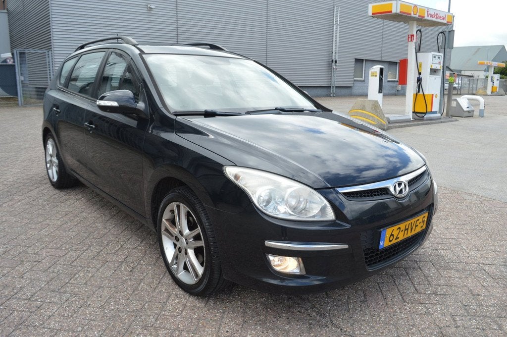 Hyundai I30 CW 1.6i i-Catcher bj09 automaat ecc schuidak, Auto's, Gebruikt, 1591 cc, 4 cilinders, Zwart