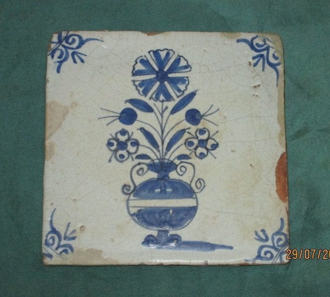 Antieke tegel met bloempot, Ophalen of Verzenden