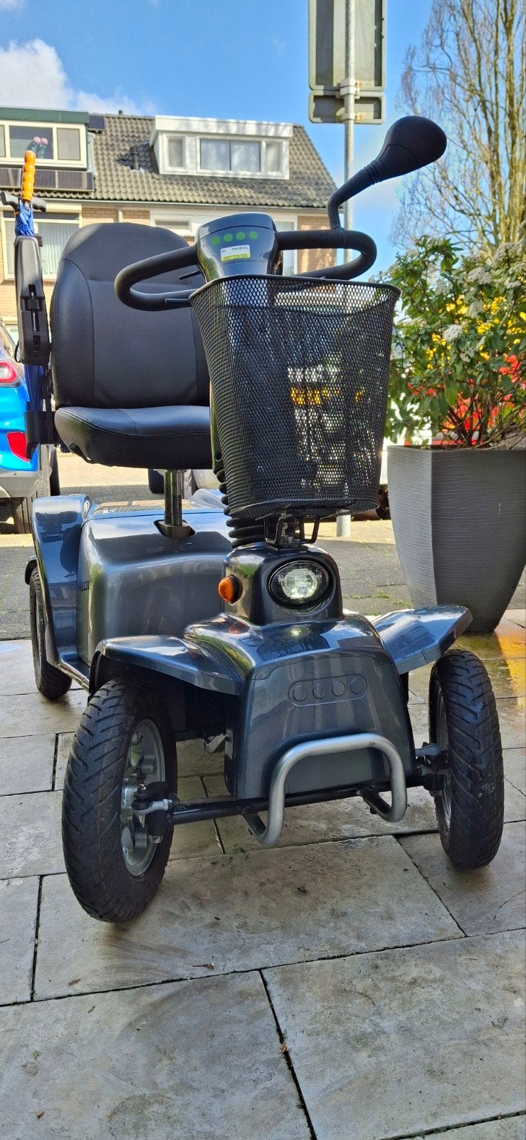 Nette 4 wiels scootmobiel met stoelvering en luchtbanden, Ophalen of Verzenden, Gebruikt
