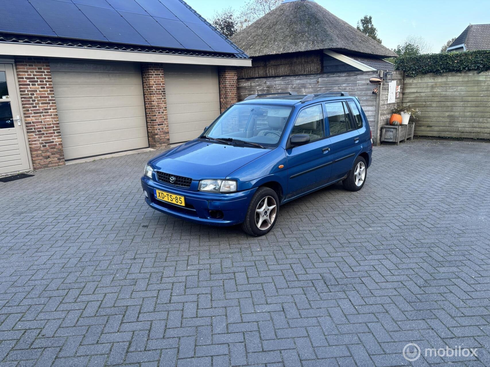 Mazda Demio 1.3 GLX Plus nwe Apk, 410 kg, 31 €/maand, Blauw, Origineel Nederlands