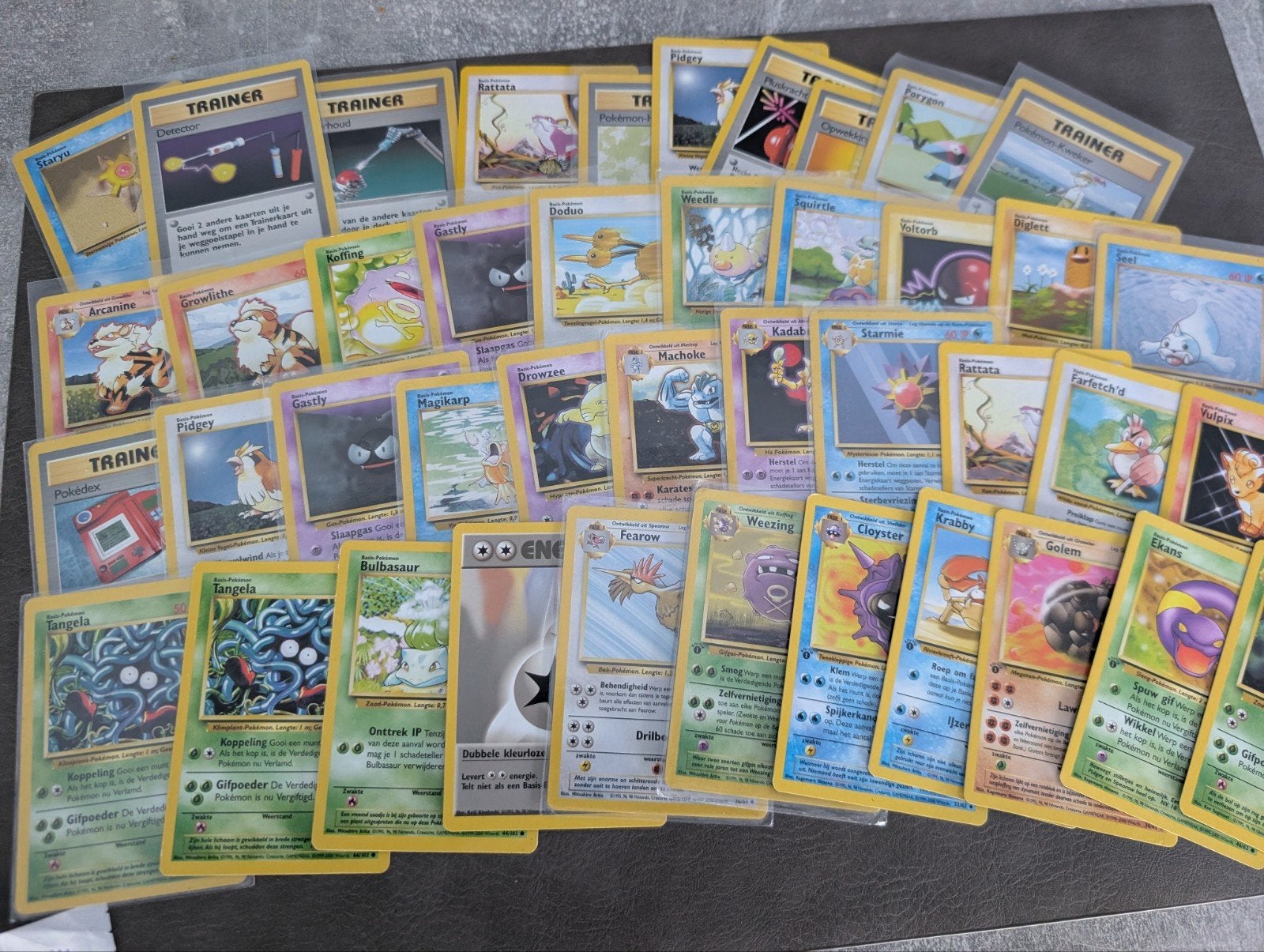 42 Nederlandse Pokémon kaarten - NM/Mint met First Editions, Ophalen of Verzenden