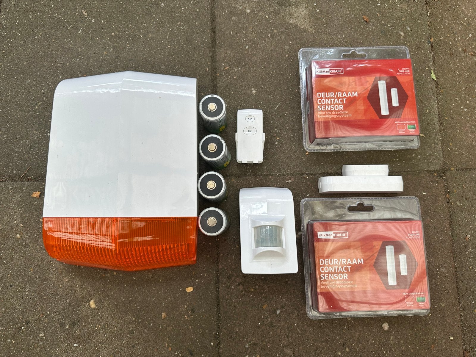 KlikAanKlikUit Alarm Alset 2000 met sensoren en afstandsbed., Doe-het-zelf en Verbouw, Ophalen, Beweging, Zo goed als nieuw, Compleet systeem