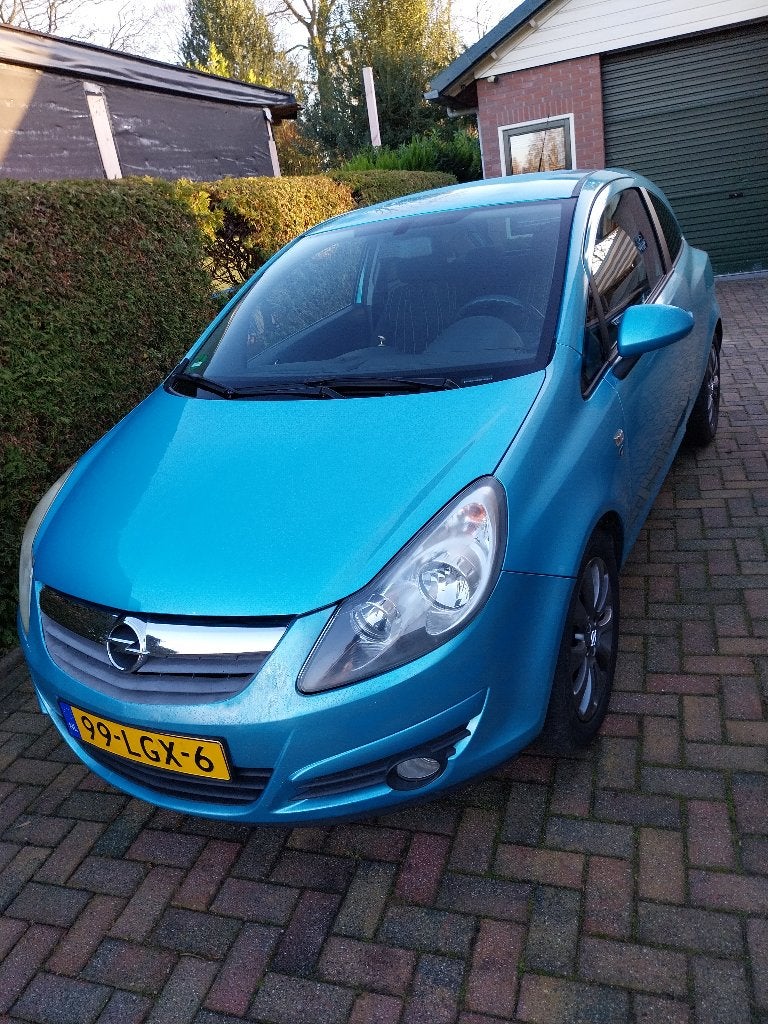 Opel Corsa 1.4 16V 3D 2010 Blauw (apk tot 26 april 2027), Voorwielaandrijving, Stof, 40 €/maand, 4 cilinders